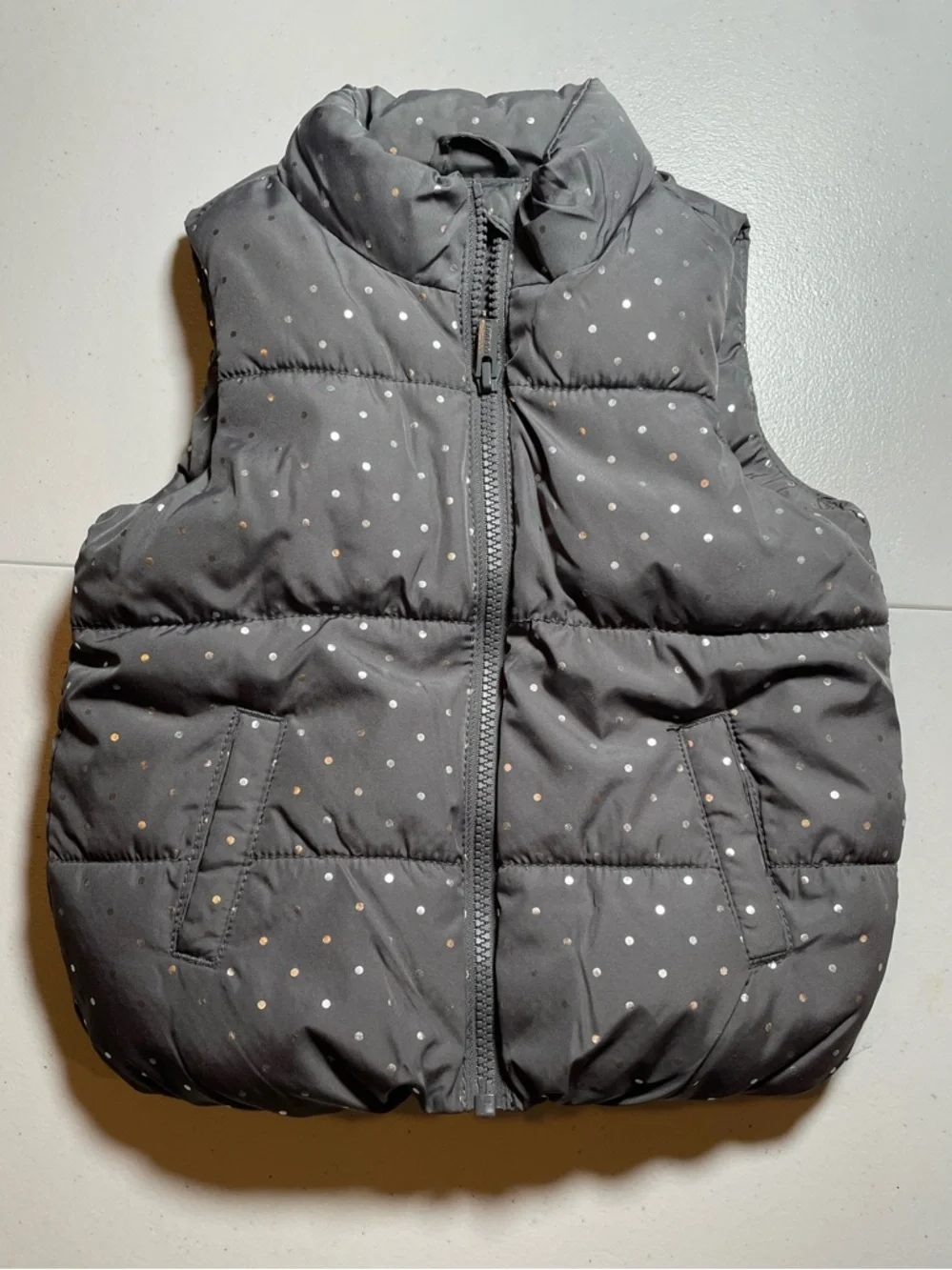 Old Navy gray puffer vest for girls. Size 3T.